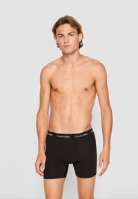 CALVIN KLEIN BOXER PACK/3 MODAL/ LARGOS NB3955A UB1 NEGROS T.L/G